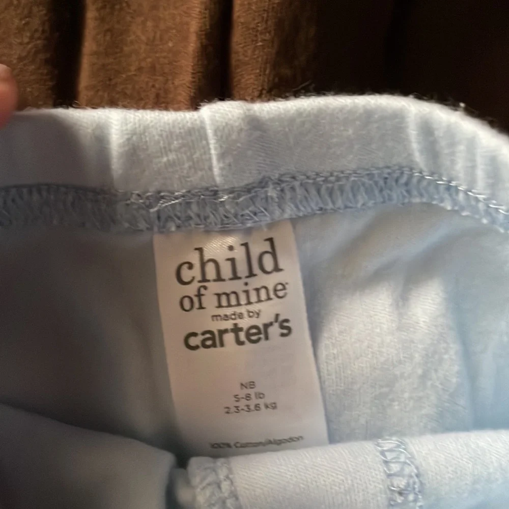 Carters, newborn, onesie, with zoo, animals with a pair of brown and blue pants
